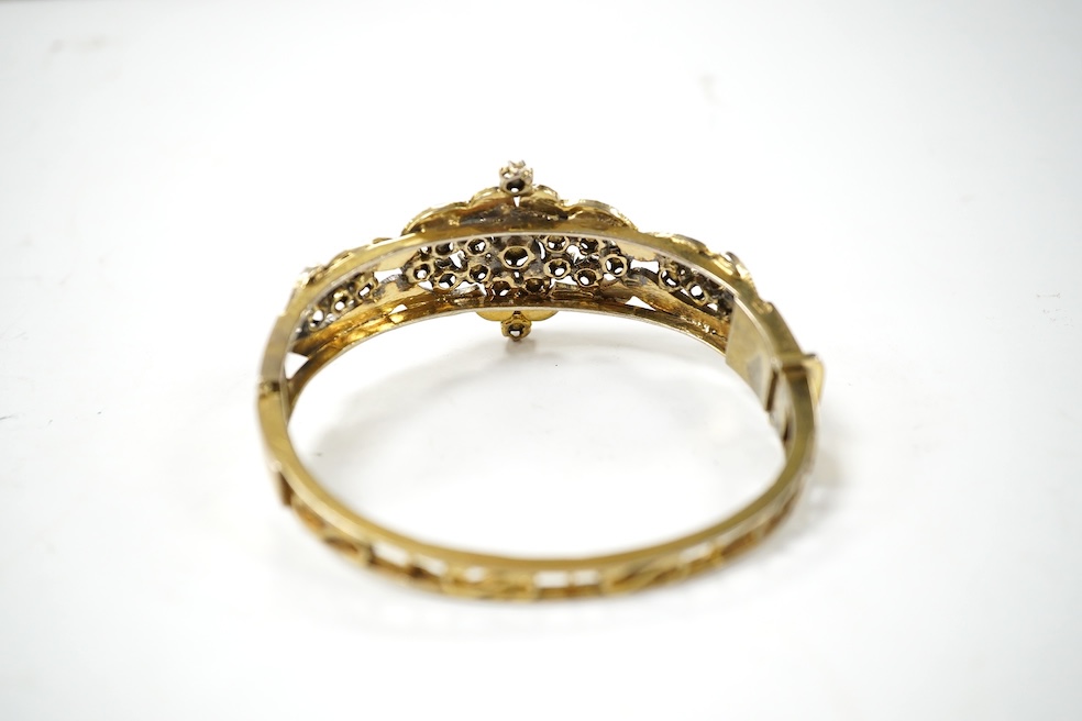 An Indian? gilt white metal and flat and rose cut diamond cluster set hinged bracelet. Condition - poor to fair